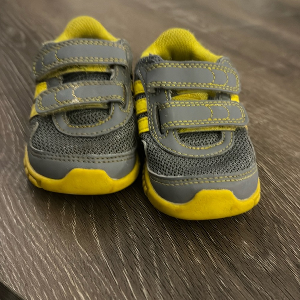 Adidas toddler size 4. Gently used and ready for the next adventure!